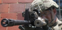 Soldier using a Green Laser Interdiction System (GLIS) 