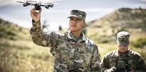 Soldier holding a Unmanned Aerial Vehicle (UAV) Drone 