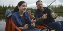 Father fishing with his daughter