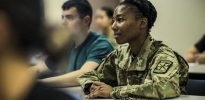 US Army Soldier listening to a lecture in a classroom